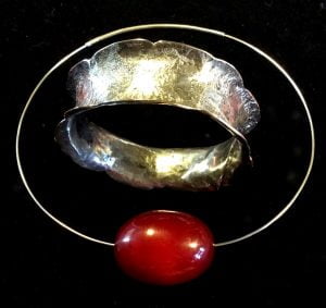 Pie Chambers. Silver torc With smoked amber, beaten silver wristband